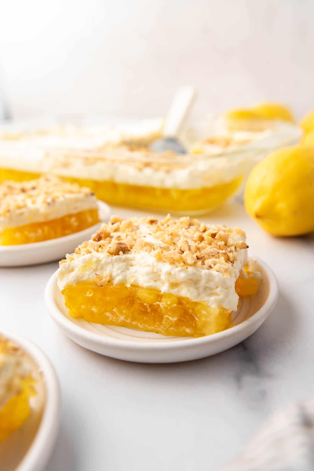 lemon pineapple jell o with whipped cream topping - Article 1